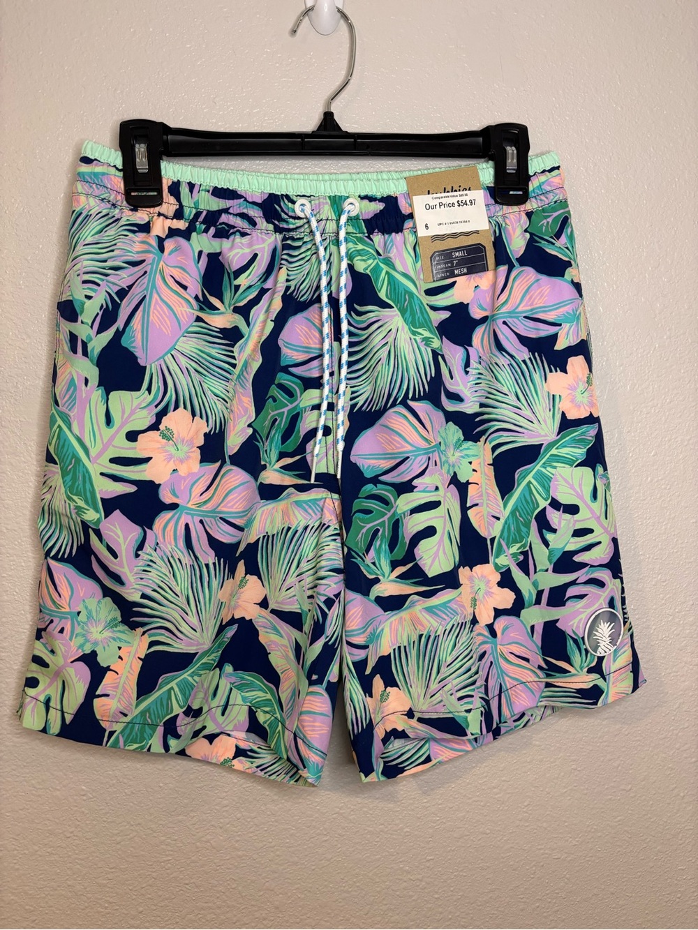 chubbies Navy Tropical Floral Swim Shorts with Pastel Green & Pink Accents